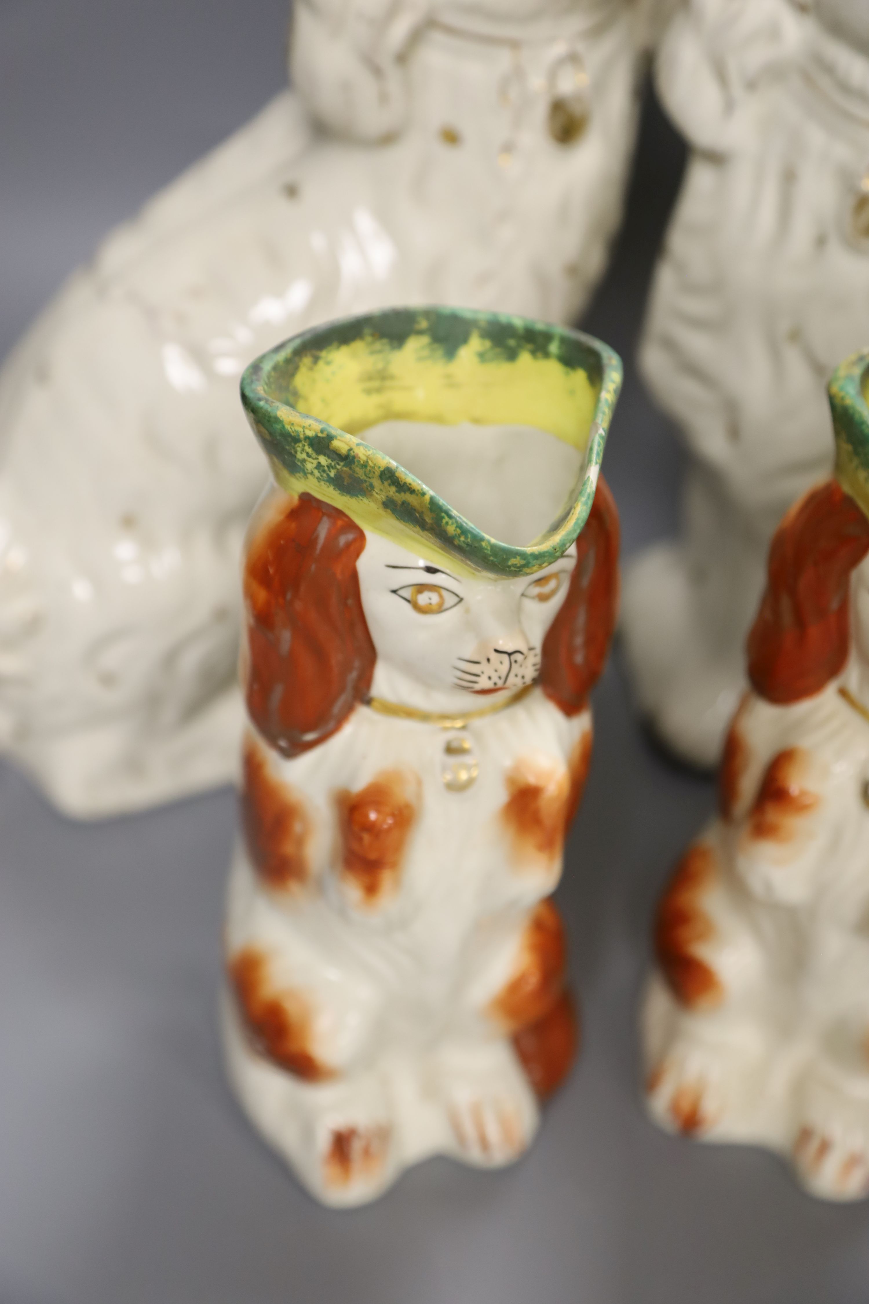 Two pairs of 19th century Staffordshire King Charles Spaniels, height 31cm